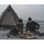 Matlaging under åpen himmel – nyt et deilig utemåltid ved bålet med Easy Camp Otra Tipi som et koselig bakteppe.